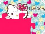 Play Hello kitty baby puzzle now